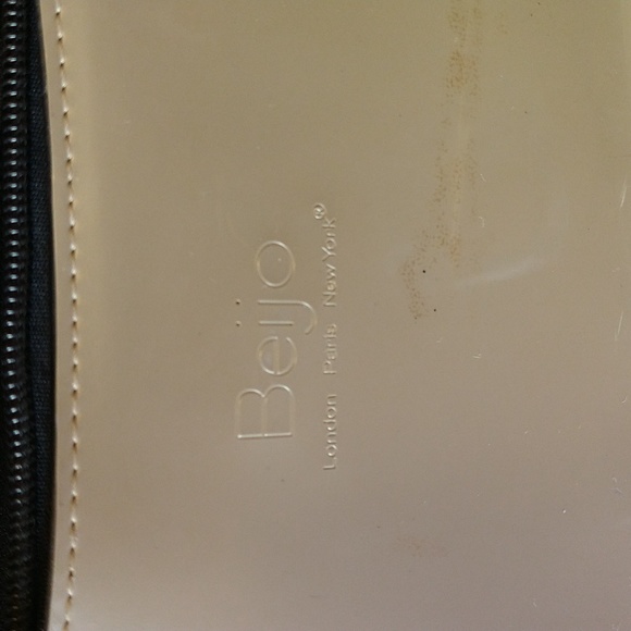 Beijo a pearlized gold color with black straps and trim. - Picture 7 of 14